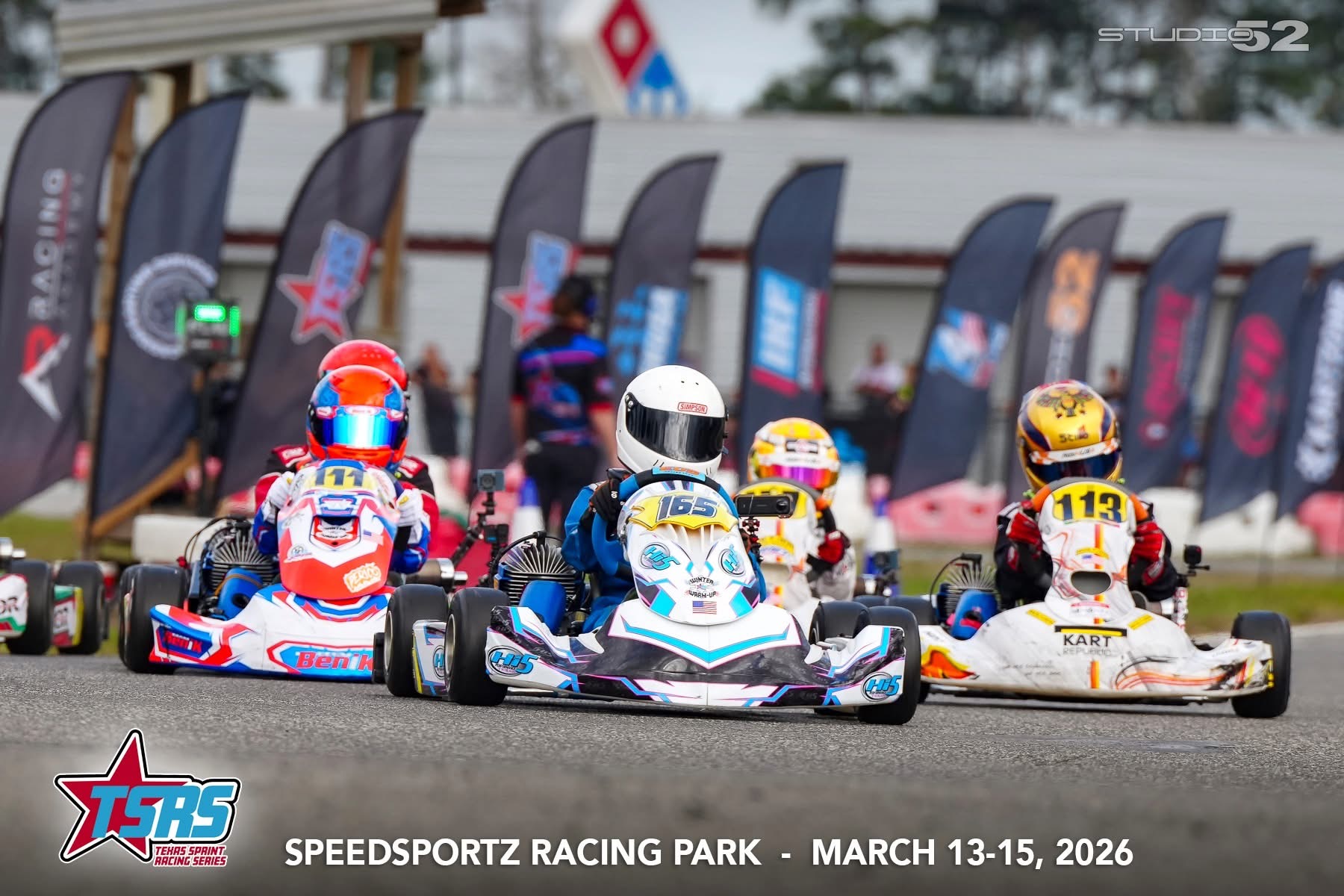 Hi5 #165 leading three-wide into the corner